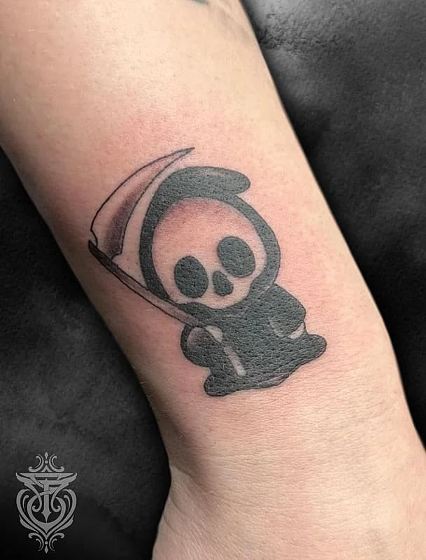 Cute panda grim reaper tattoo on forearm.
