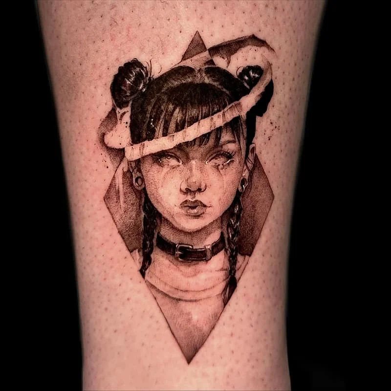 Black-and-grey portrait tattoo of a girl with braids.