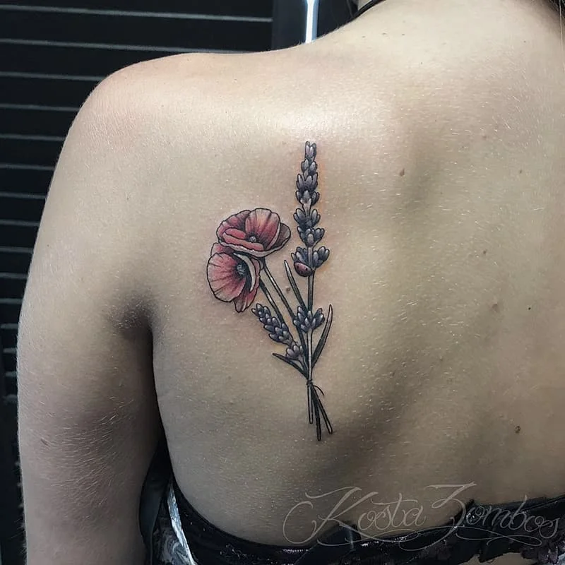 Colourful watercolor floral tattoo on shoulder and back