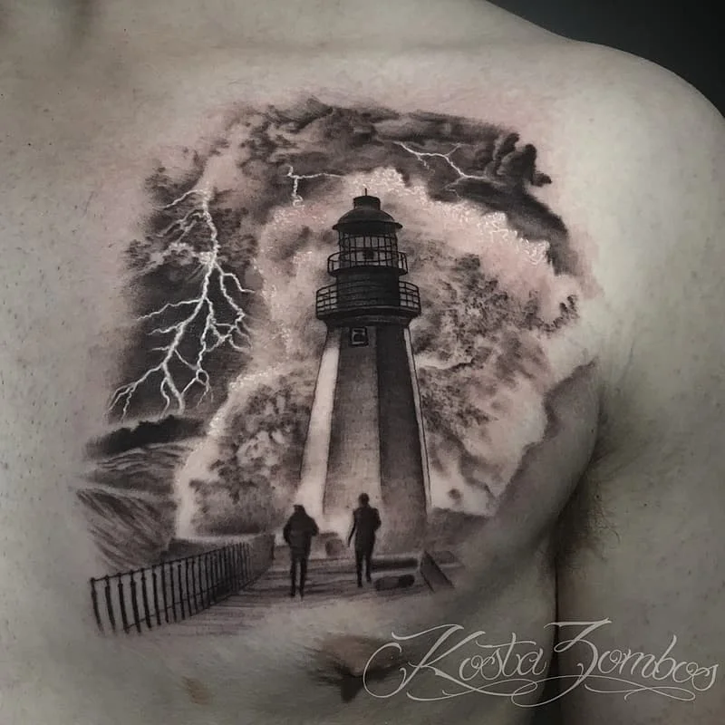 Realistic lighthouse tattoo on chest with storm and lightning.