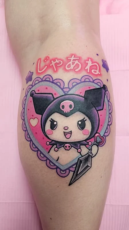 Colorful cute character tattoo on thigh with heart and skull.