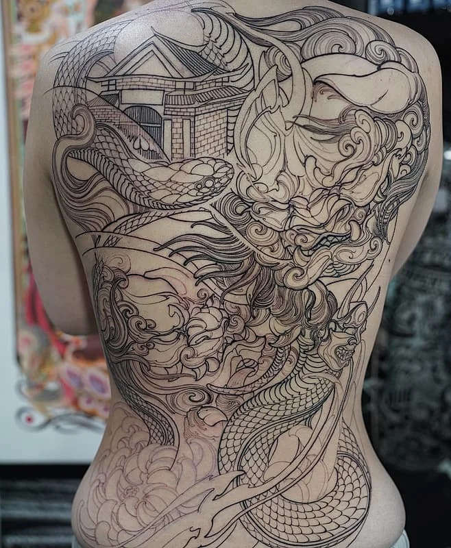 Large Japanese dragon tattoo on the back.