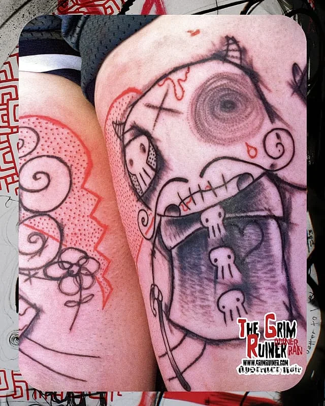 Whimsical illustrative blackwork tattoo on the arm
