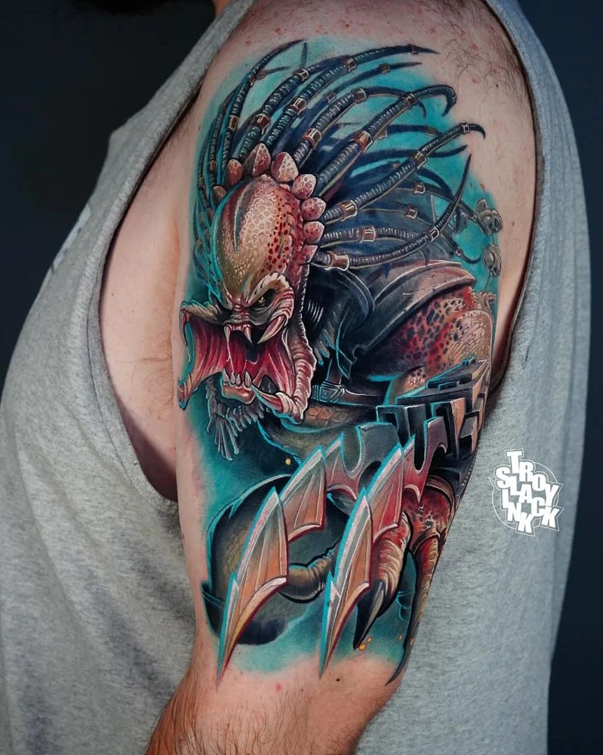 Large 3D tattoo of Predator on arm.