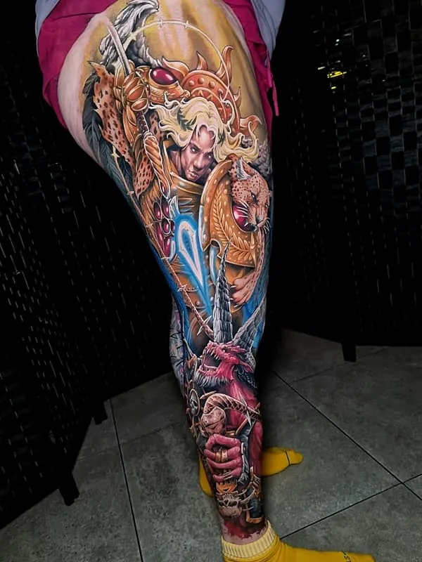 Colorful leg tattoo of a warrior with animals.