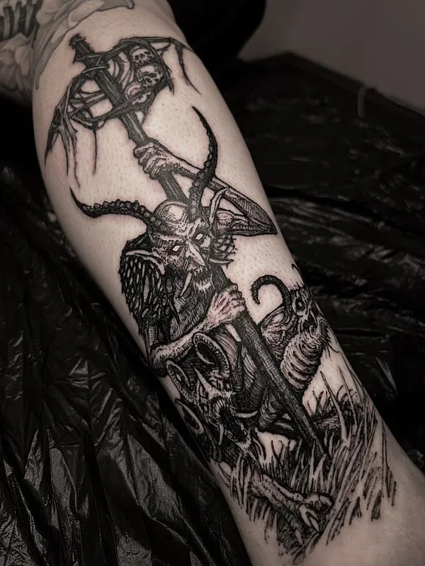 Large blackwork demon tattoo on forearm